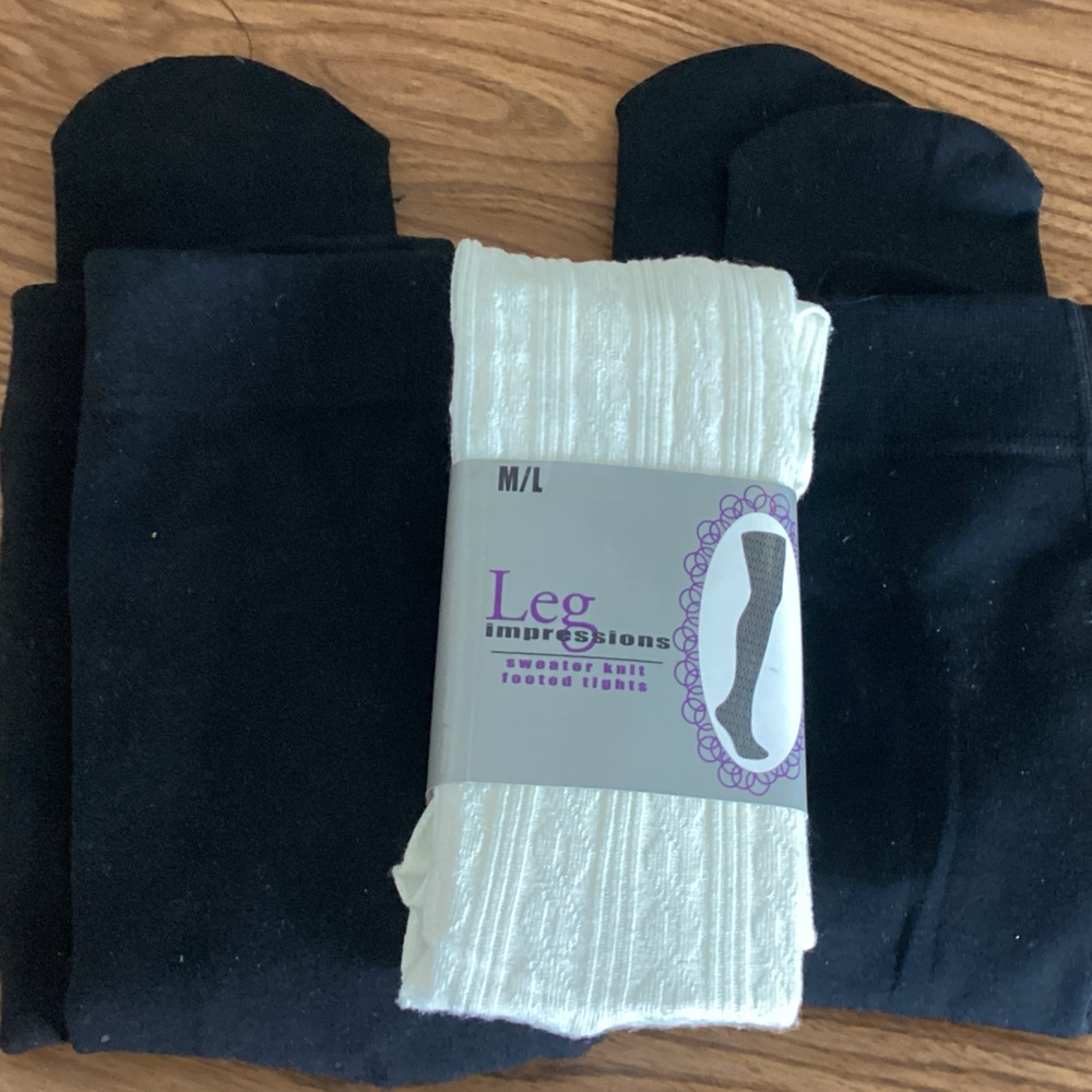 Three pair of footed leggings